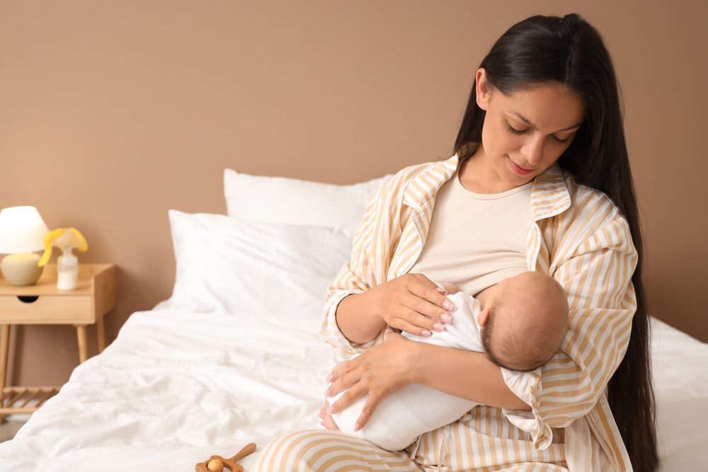 Woman breastfeeding her newborn